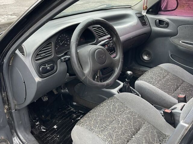 Чорний Деу Сенс, об'ємом двигуна 1.5 л та пробігом 200 тис. км за 1450 $, фото 10 на Automoto.ua