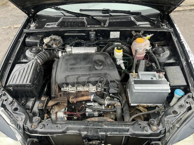 Чорний Деу Сенс, об'ємом двигуна 1.4 л та пробігом 202 тис. км за 1000 $, фото 4 на Automoto.ua