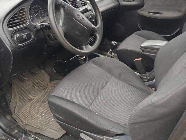 Чорний Деу Сенс, об'ємом двигуна 1.6 л та пробігом 230 тис. км за 2000 $, фото 1 на Automoto.ua