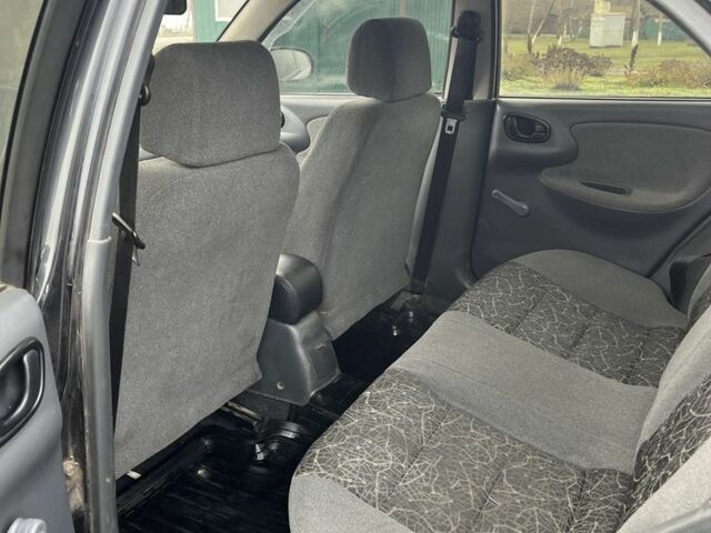 Черный Дэу Сенс, объемом двигателя 1.5 л и пробегом 200 тыс. км за 1657 $, фото 7 на Automoto.ua