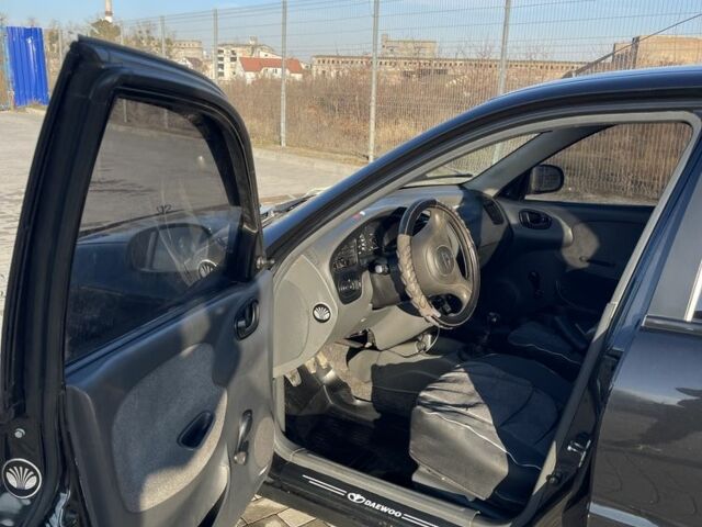 Черный Дэу Сенс, объемом двигателя 1.4 л и пробегом 177 тыс. км за 1750 $, фото 4 на Automoto.ua