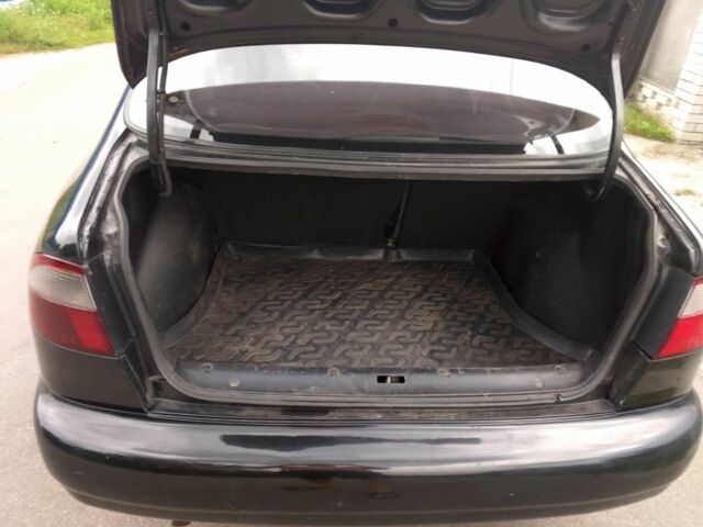 Чорний Деу Сенс, об'ємом двигуна 1.5 л та пробігом 230 тис. км за 2000 $, фото 4 на Automoto.ua