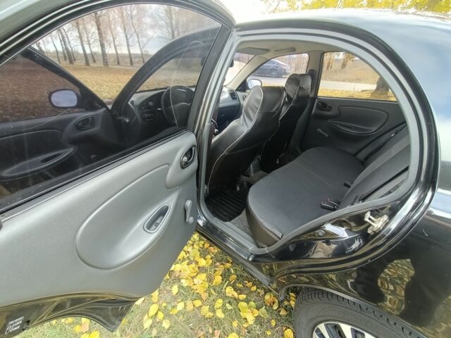 Чорний Деу Сенс, об'ємом двигуна 1.4 л та пробігом 217 тис. км за 2100 $, фото 7 на Automoto.ua