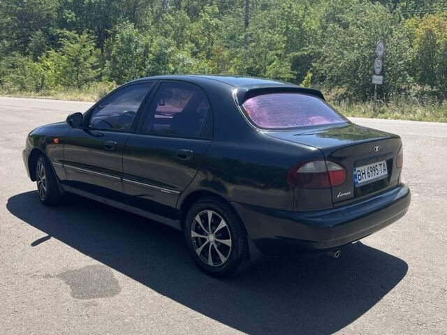 Черный Дэу Сенс, объемом двигателя 1.4 л и пробегом 220 тыс. км за 2300 $, фото 4 на Automoto.ua