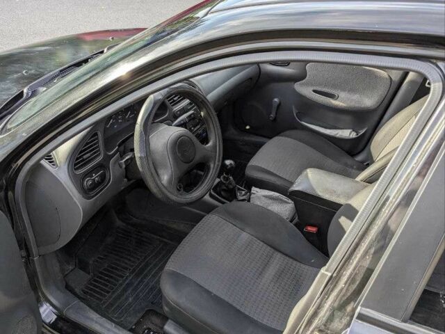 Черный Дэу Сенс, объемом двигателя 1.5 л и пробегом 211 тыс. км за 1400 $, фото 9 на Automoto.ua