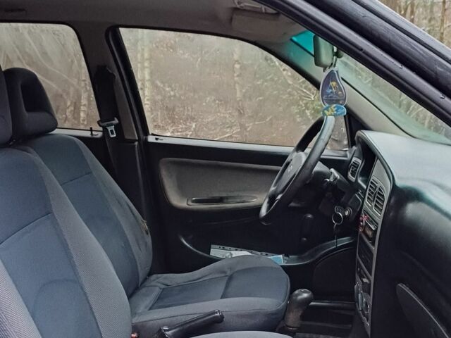 Черный Дэу Сенс, объемом двигателя 1.6 л и пробегом 250 тыс. км за 1250 $, фото 4 на Automoto.ua