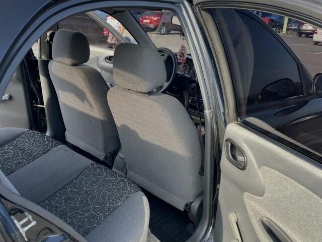 Черный Дэу Сенс, объемом двигателя 1.4 л и пробегом 115 тыс. км за 1600 $, фото 4 на Automoto.ua