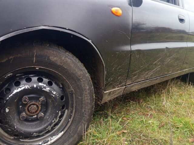 Чорний Деу Сенс, об'ємом двигуна 1.4 л та пробігом 171 тис. км за 1200 $, фото 7 на Automoto.ua