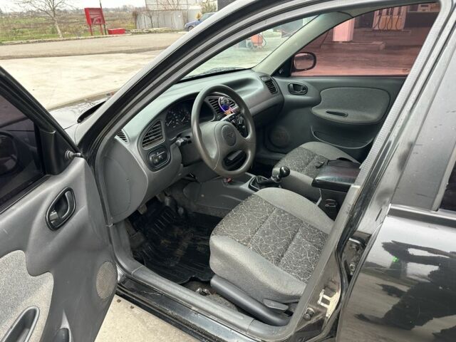 Черный Дэу Сенс, объемом двигателя 1.5 л и пробегом 260 тыс. км за 2400 $, фото 7 на Automoto.ua