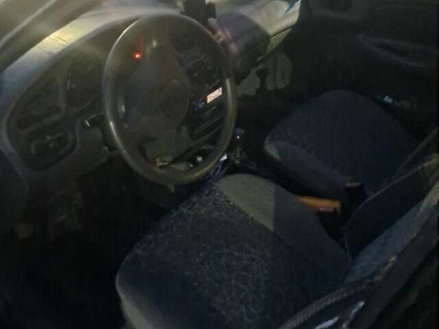 Черный Дэу Сенс, объемом двигателя 1.5 л и пробегом 300 тыс. км за 1209 $, фото 4 на Automoto.ua