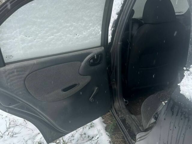 Чорний Деу Сенс, об'ємом двигуна 1.4 л та пробігом 200 тис. км за 1750 $, фото 3 на Automoto.ua