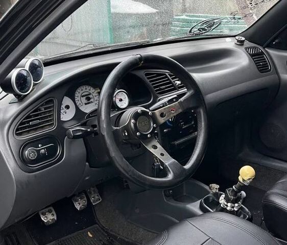 Черный Дэу Сенс, объемом двигателя 1.5 л и пробегом 263 тыс. км за 3500 $, фото 6 на Automoto.ua