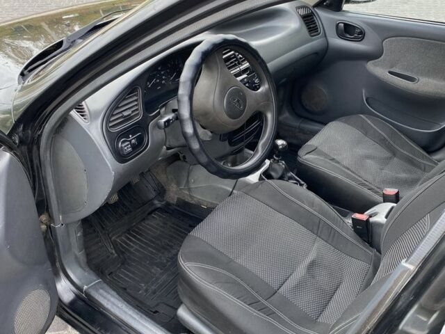 Черный Дэу Сенс, объемом двигателя 1.5 л и пробегом 300 тыс. км за 2300 $, фото 5 на Automoto.ua