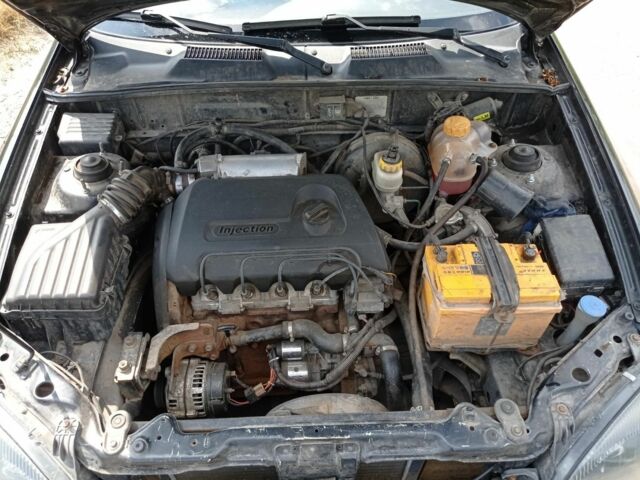 Черный Дэу Сенс, объемом двигателя 1.4 л и пробегом 200 тыс. км за 2000 $, фото 7 на Automoto.ua