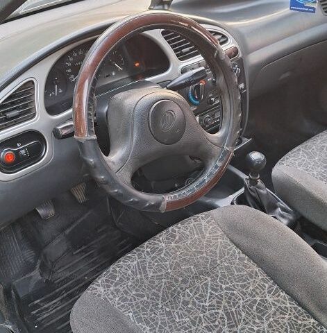 Черный Дэу Сенс, объемом двигателя 1.4 л и пробегом 168 тыс. км за 1330 $, фото 4 на Automoto.ua