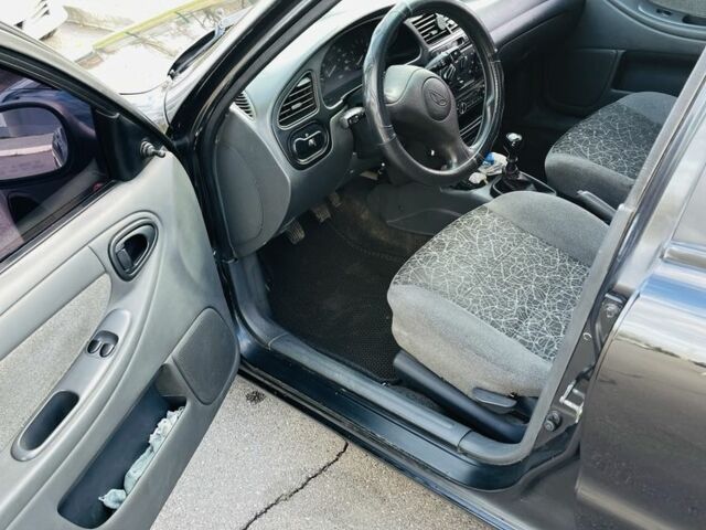 Черный Дэу Сенс, объемом двигателя 1.6 л и пробегом 326 тыс. км за 2700 $, фото 5 на Automoto.ua