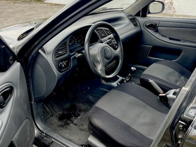 Черный Дэу Сенс, объемом двигателя 1.5 л и пробегом 205 тыс. км за 2800 $, фото 5 на Automoto.ua