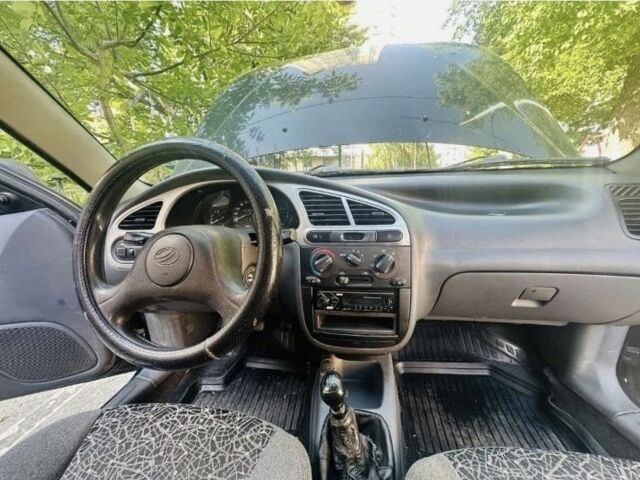 Черный Дэу Сенс, объемом двигателя 1.3 л и пробегом 200 тыс. км за 2500 $, фото 2 на Automoto.ua
