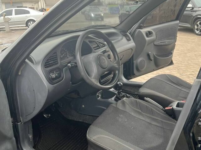 Черный Дэу Сенс, объемом двигателя 1.3 л и пробегом 150 тыс. км за 1900 $, фото 6 на Automoto.ua