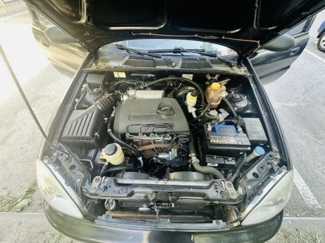 Черный Дэу Сенс, объемом двигателя 1.3 л и пробегом 200 тыс. км за 2500 $, фото 7 на Automoto.ua