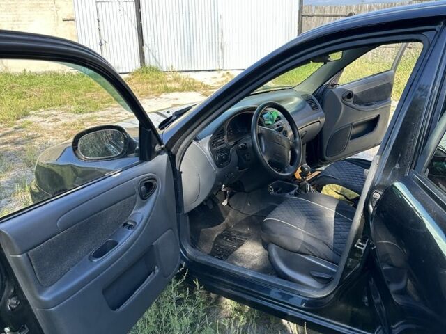 Чорний Деу Сенс, об'ємом двигуна 1.5 л та пробігом 143 тис. км за 2350 $, фото 1 на Automoto.ua