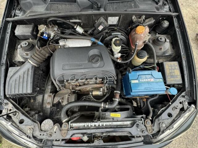 Черный Дэу Сенс, объемом двигателя 1 л и пробегом 210 тыс. км за 2200 $, фото 2 на Automoto.ua