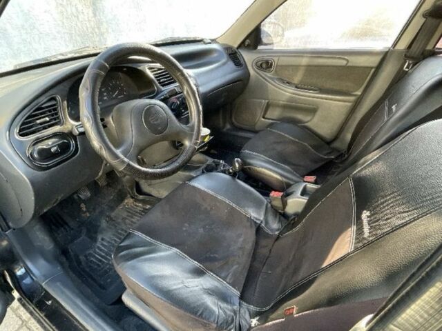 Чорний Деу Сенс, об'ємом двигуна 1.3 л та пробігом 300 тис. км за 1500 $, фото 5 на Automoto.ua