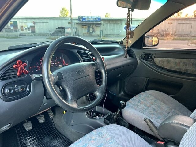 Красный Дэу Сенс, объемом двигателя 1.5 л и пробегом 150 тыс. км за 3300 $, фото 5 на Automoto.ua