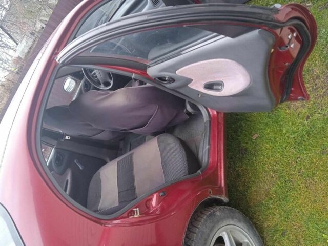 Красный Дэу Сенс, объемом двигателя 1.5 л и пробегом 450 тыс. км за 1429 $, фото 4 на Automoto.ua