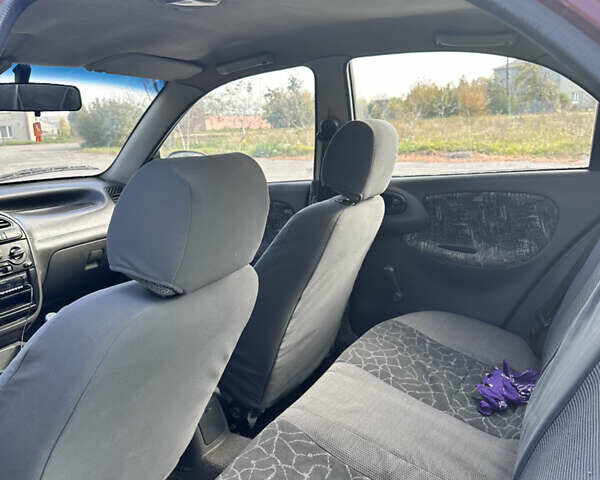 Красный Дэу Сенс, объемом двигателя 1.3 л и пробегом 168 тыс. км за 1450 $, фото 11 на Automoto.ua