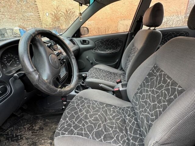 Красный Дэу Сенс, объемом двигателя 1.5 л и пробегом 266 тыс. км за 2400 $, фото 10 на Automoto.ua