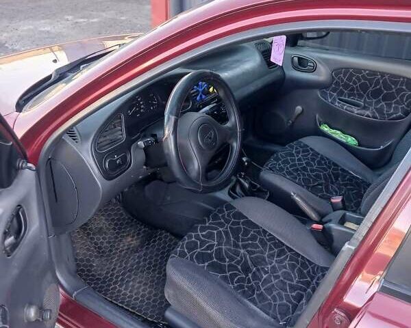 Красный Дэу Сенс, объемом двигателя 1.3 л и пробегом 240 тыс. км за 1400 $, фото 1 на Automoto.ua