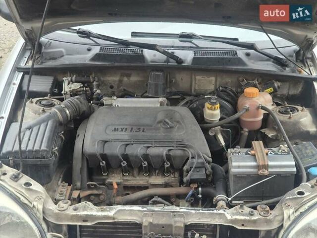 Червоний Деу Сенс, об'ємом двигуна 1.3 л та пробігом 300 тис. км за 1799 $, фото 5 на Automoto.ua