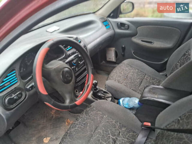 Красный Дэу Сенс, объемом двигателя 1.3 л и пробегом 295 тыс. км за 1550 $, фото 3 на Automoto.ua