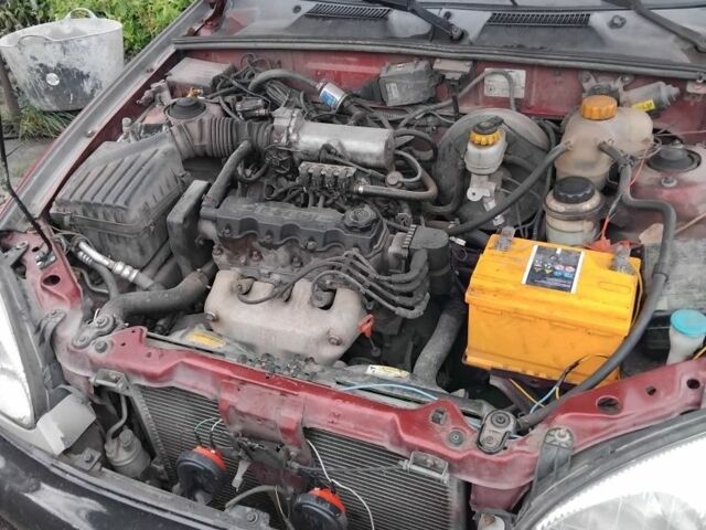 Червоний Деу Сенс, об'ємом двигуна 1.5 л та пробігом 111 тис. км за 1600 $, фото 4 на Automoto.ua