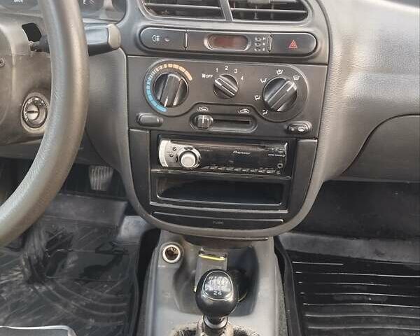 Красный Дэу Сенс, объемом двигателя 1.3 л и пробегом 287 тыс. км за 2500 $, фото 6 на Automoto.ua