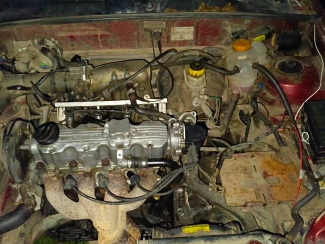 Красный Дэу Сенс, объемом двигателя 1.5 л и пробегом 270 тыс. км за 949 $, фото 6 на Automoto.ua