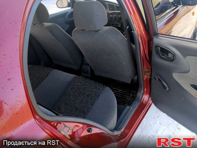 Красный Дэу Сенс, объемом двигателя 1.3 л и пробегом 209 тыс. км за 2450 $, фото 7 на Automoto.ua