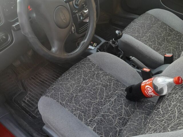 Красный Дэу Сенс, объемом двигателя 1.5 л и пробегом 200 тыс. км за 2508 $, фото 4 на Automoto.ua