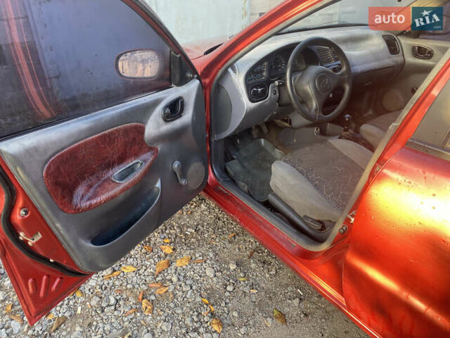 Красный Дэу Сенс, объемом двигателя 1.3 л и пробегом 84 тыс. км за 1100 $, фото 5 на Automoto.ua