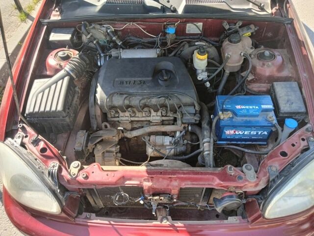 Червоний Деу Сенс, об'ємом двигуна 1.3 л та пробігом 226 тис. км за 1456 $, фото 7 на Automoto.ua