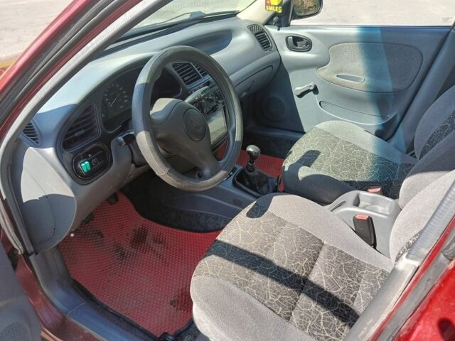 Червоний Деу Сенс, об'ємом двигуна 1.3 л та пробігом 226 тис. км за 1456 $, фото 2 на Automoto.ua