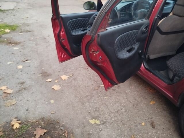 Деу Сенс 2005 у Одесі на Automoto.ua Червоний Деу Сенс, об'ємом двигуна 1.5 л та пробігом 257 тис. км за 2000 $, фото 12 на Automoto.ua