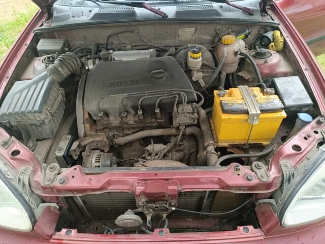 Червоний Деу Сенс, об'ємом двигуна 1.3 л та пробігом 209 тис. км за 1691 $, фото 2 на Automoto.ua