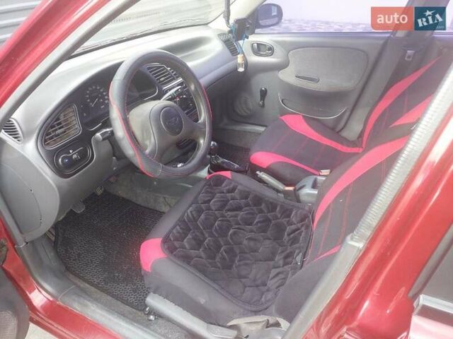 Деу Сенс 2006 у Миколаєві на Automoto.ua Червоний Деу Сенс, об'ємом двигуна 1.3 л та пробігом 150 тис. км за 2000 $, фото 12 на Automoto.ua