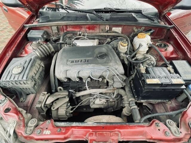 Красный Дэу Сенс, объемом двигателя 1.3 л и пробегом 200 тыс. км за 2100 $, фото 12 на Automoto.ua