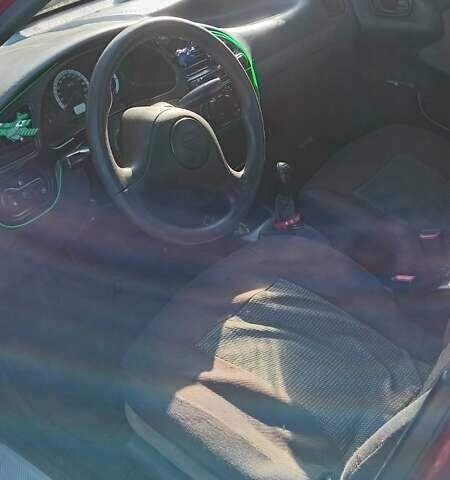 Красный Дэу Сенс, объемом двигателя 1.3 л и пробегом 95 тыс. км за 1400 $, фото 10 на Automoto.ua