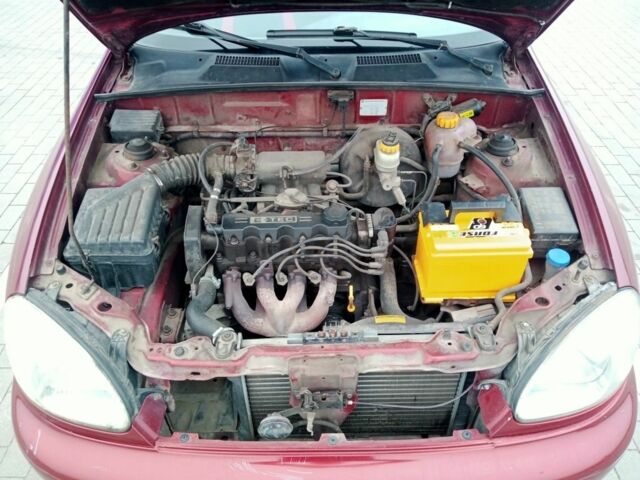 Красный Дэу Сенс, объемом двигателя 1.5 л и пробегом 322 тыс. км за 2300 $, фото 4 на Automoto.ua