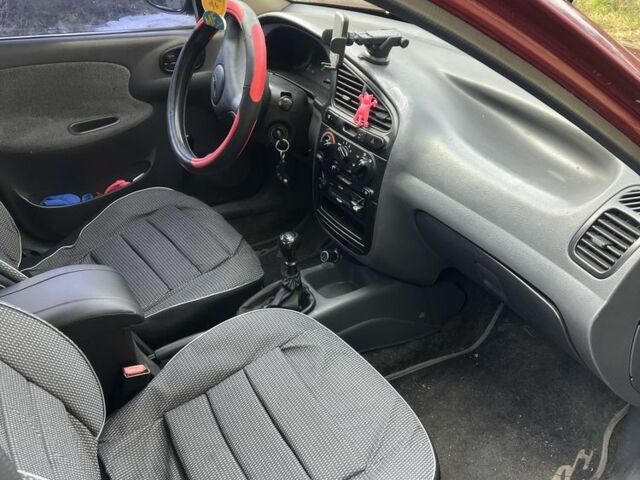 Красный Дэу Сенс, объемом двигателя 1.5 л и пробегом 333 тыс. км за 1893 $, фото 4 на Automoto.ua