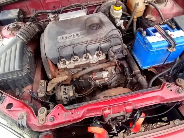 Красный Дэу Сенс, объемом двигателя 1.3 л и пробегом 300 тыс. км за 480 $, фото 4 на Automoto.ua